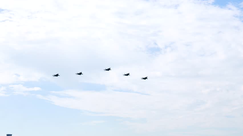 F-15 fighter aircraft conduct a formation flight,