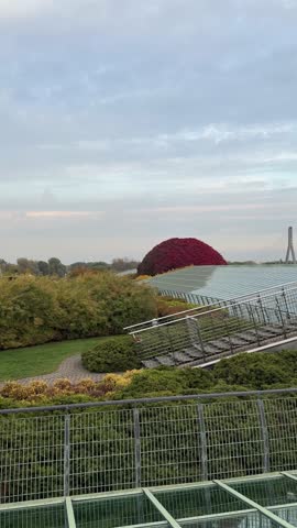Warsaw university library garden in autumn. Famous rooftop in Poland panoramic view. Fall botanical design, multicolored leaves.