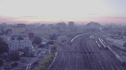 Sunrise Over Urban Railway and Industrial Landscape