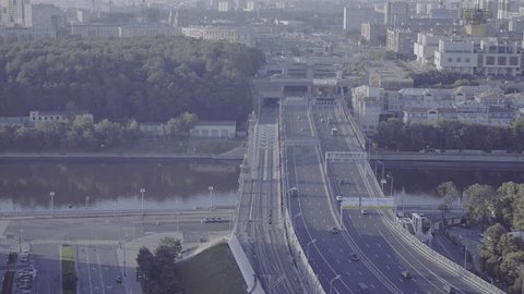 Drone Flying above Arched Bridge Traffic over