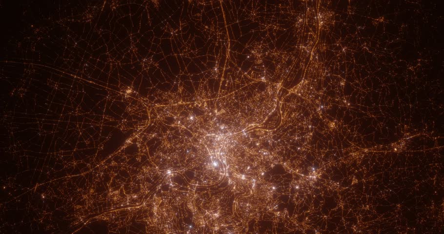 Liege (Belgium) aerial view at night. Top view on modern city with street lights. Camera is flying above the city, moving backward