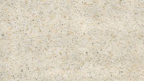 Water droplet impacts sandy surface, forming symmetrical ripple waves. Sunlight enhances translucent rings in fluid motion. Minimalist scene of natural rhythm and energy. - Powered by Shutterstock - Get 15% off with code: PIKWIZARD15