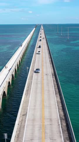 Aerial shot of the Seven Mile Bridge in Florida which connects several of the Florida Keys on the way to Key West. Vertical Video.