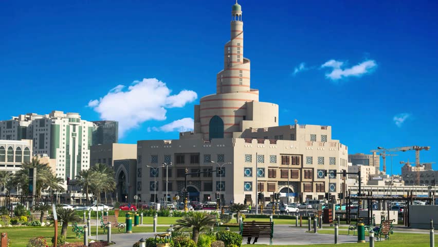 Doha, Qatar  Panoramic Aerial View of Doha City with Iconic Doha Fanar Mosque sunset time Doha, Qatar  Mosque "Al Fanar Masjid" in Souq Waqif area of ​​Doha with excellent architectu