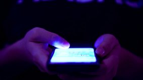 Close-up of hands holding a smartphone, scrolling social media with glowing icons for likes, followers, and comments; concept of digital engagement and influencer. - Powered by Shutterstock - Get 15% off with code: PIKWIZARD15