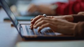 Close-up of programmers’ hands typing on keyboards and laptops at an IT office, illustrating coding, software development, and modern coworking workspace. - Powered by Shutterstock - Get 15% off with code: PIKWIZARD15