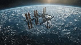 Aerial view of the International Space Station orbiting Earth at sunrise, highlighting the planet’s beauty from space. - Powered by Shutterstock - Get 15% off with code: PIKWIZARD15