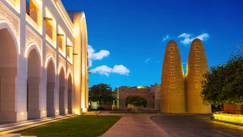 Doha, Qatar Panoramic view of Katara cultural village Katara mosque and traditional Arabian pigeon houses are in the frame, people are walking around, at daytime, Doha, Qatar Doha, Qatar