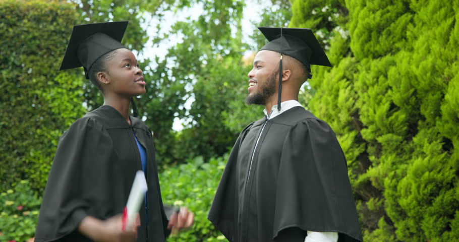 Graduating students in caps and gowns celebrating success outdoors, smiling happily. Graduation, celebration, achievement, commencement, education, joy