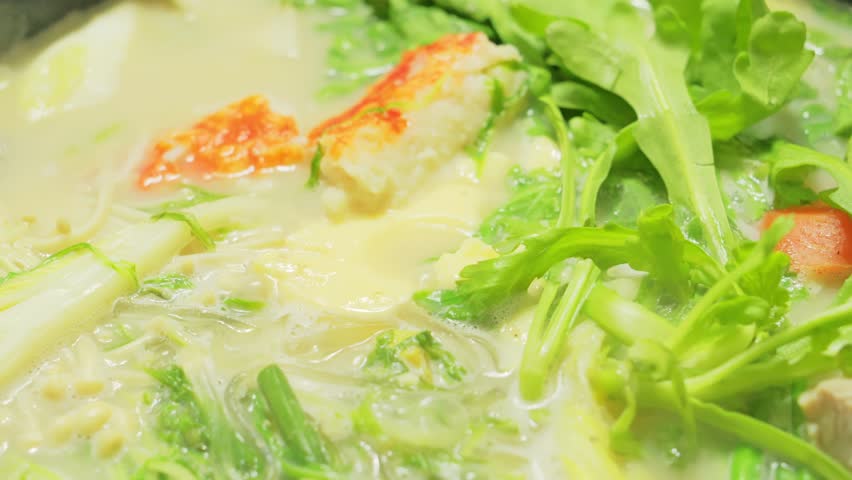 Hot pot dishes featuring plenty of chicken, white fish, vegetables, and more—warm winter fare