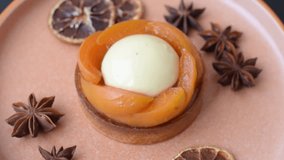 Pie, sweet round tart with apricot pieces, cream and nuts. Sweet tart with peach as a food background - Powered by Shutterstock - Get 15% off with code: PIKWIZARD15
