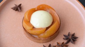 Pie, sweet round tart with apricot pieces, cream and nuts. Sweet tart with peach as a food background - Powered by Shutterstock - Get 15% off with code: PIKWIZARD15