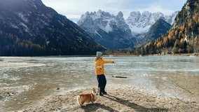Exploring Lago di Landro in Italy with a dog on a sunny winter day - Powered by Shutterstock - Get 15% off with code: PIKWIZARD15