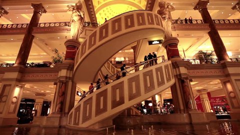 LAS VEGAS NEVADA APR 2013: Major economic tourism destination. Famous luxurious destination.  Interior atrium with ornate architecture and splendid stairs and balconies. 3,960 rooms in six towers.