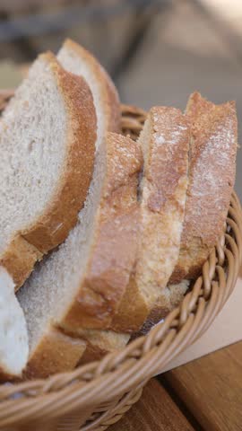 Freshly baked bread served in a rustic basket at a cozy cafe
