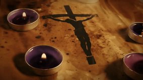 Close-up of a Christian cross symbol placed on aged parchment illuminated by warm candlelight, evoking faith, spirituality, and religious heritage. - Powered by Shutterstock - Get 15% off with code: PIKWIZARD15