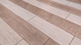 Wood look ceramic tiles with textured inserts closeup camera movement neutral beige and gray tones for renovation interior design flooring and wall finish b roll - Powered by Shutterstock - Get 15% off with code: PIKWIZARD15