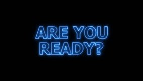 The phrase "ARE YOU READY?" is presented in bright blue neon lettering on a black background. The text is clearly visible with a soft, radiant glow. Clear details and vibrant colors enhance visual... - Powered by Shutterstock - Get 15% off with code: PIKWIZARD15