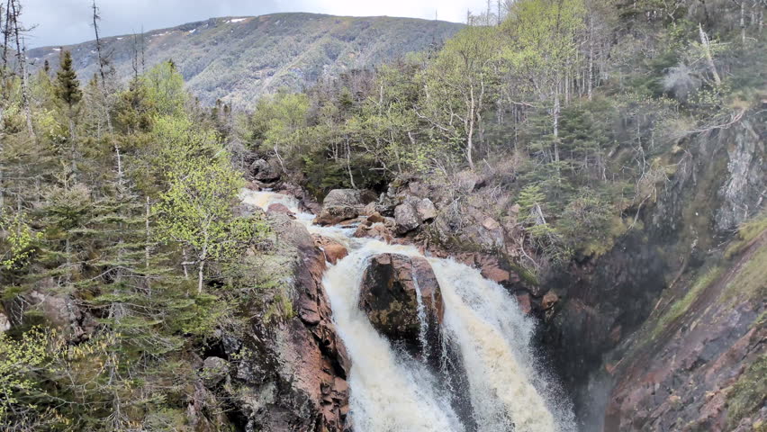 The Crow Gulch Brook waterfalls on the Gros Morne Mountain hiking trail in the Gros Morne National Park (Norris Point, Newfoundland, Canada)