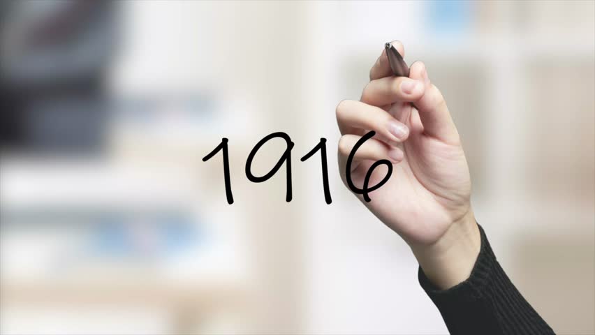 1916 Handwriting using black marker on glass