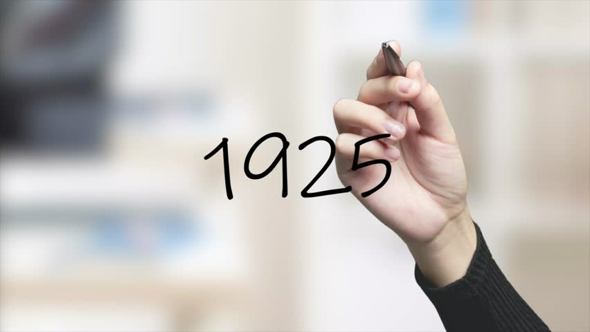 1925 Handwriting using black marker on glass
