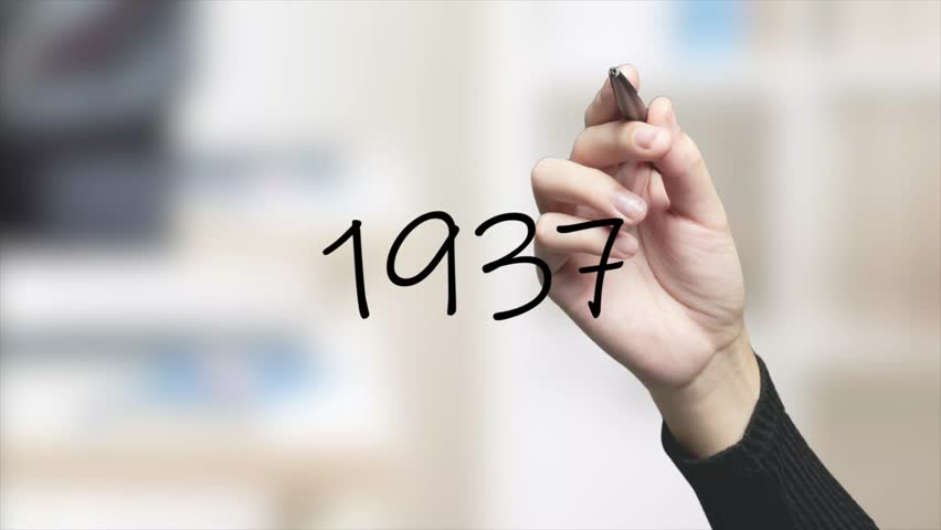 1937 Handwriting using black marker on glass