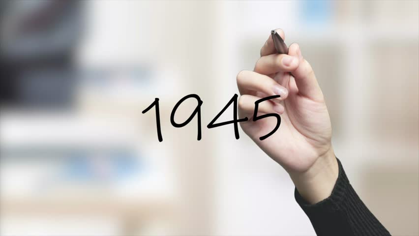 1945 Handwriting using black marker on glass