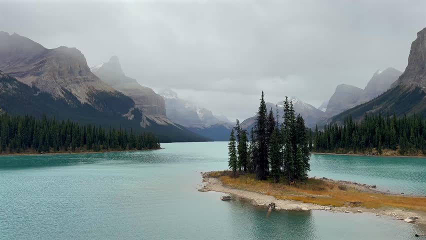 Spirit Island and vibrant autumn landscape on Maligne Lake, Jasper National Park, Alberta, Canada
