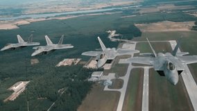 4 F-22 Raptor aircraft form a formation
Four F-22 Raptor stealth fighter jets fly in a tight formation across the open sky, showcasing the precision, power, and maneuverability of this fifth-generatio - Powered by Shutterstock - Get 15% off with code: PIKWIZARD15
