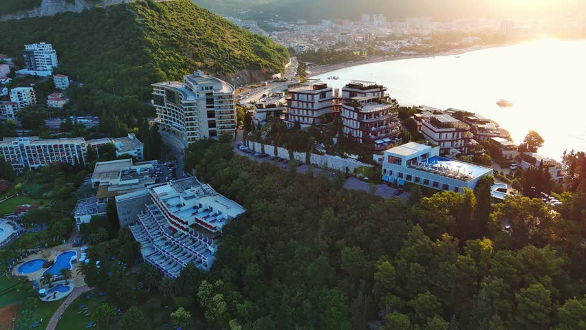 Hotel Dukley with chic apartments, gardens and sandy beaches near the Adriatic Sea against the backdrop of the coastal Montenegrin cities