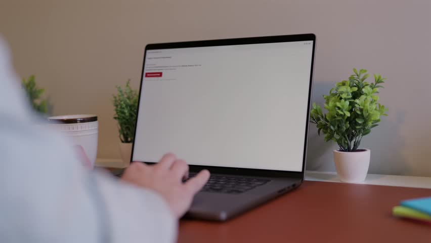 Middle Aged Executive Man Working From Home Falls Victim to Spear Phishing Ransomware Attack - Common Cybersecurity Scenario Concept