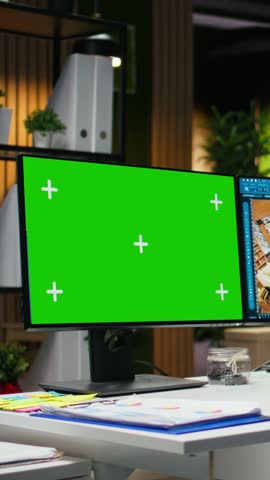 Vertical Video Chroma key and CAD program used by african american architectural specialist to design a modern apartment, 3D render interface on dual monitors. Architectural 3D software. Camera A.