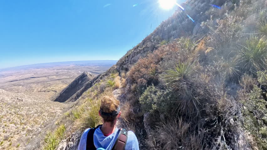 Overhead of Woman Hiking Down Narrow Trail in Guadalupe Mountains National Park