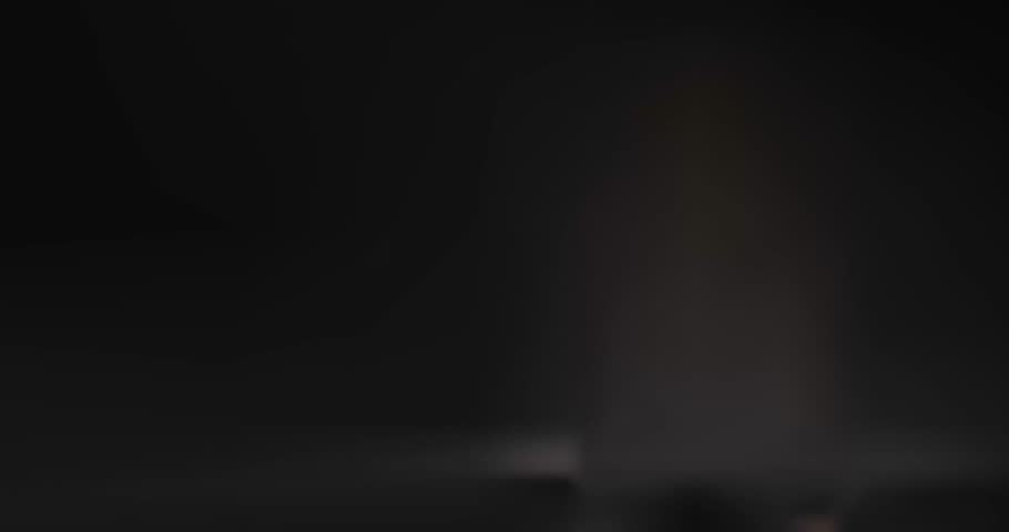 Black Friday. Moving dark background with podium, neon glow, flying percentage signs, and gift boxes. Sale, discounts, and special offers. Marketing and Advertising. Realistic 3D animated graphics