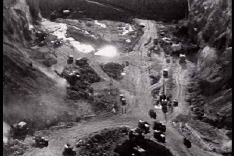 1930s - The construction of the Boulder Dam project in 1936 in the Bureau of Land Reclamation film includes impressive footage of earthmoving equipment and landslides.