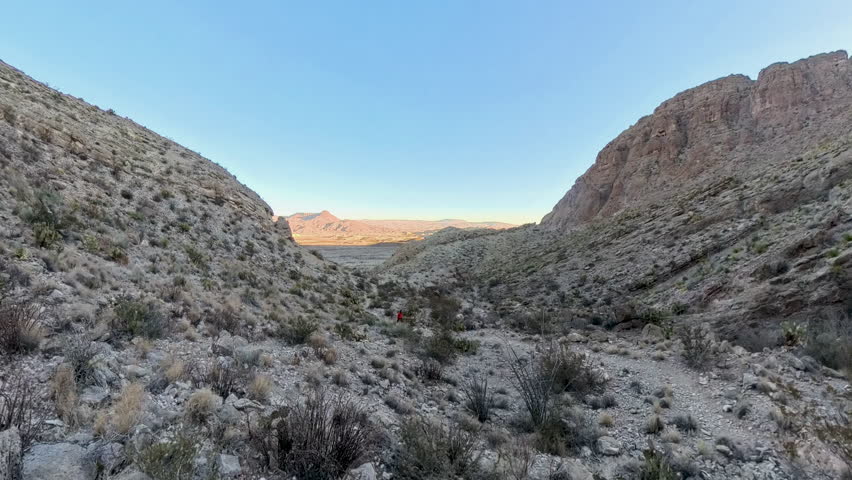 Woman Hikes up Mesa de Anguila Trail in Big Bend