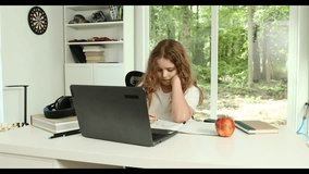 Kid preparing for exam with laptop. Student sitting at desk during distance education class. Smart child in virtual schoolwork and study. Child learning mathematics on laptop in home classroom. - Powered by Shutterstock - Get 15% off with code: PIKWIZARD15