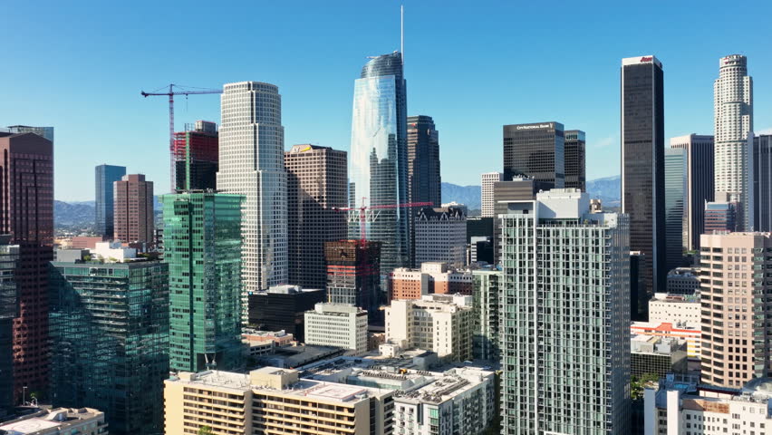 Los Angeles California skyline panorama. The drone flies above Los Angeles. Los Angeles downtown skyline from top. Downtown Los Angeles aerial view.
