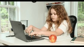 E-learning. Home learn for child. Kid learning on laptop e-learning. Teen student learn lesson on laptop. Child study schoolwork in home classroom interior. Online learn. Education and learning online - Powered by Shutterstock - Get 15% off with code: PIKWIZARD15