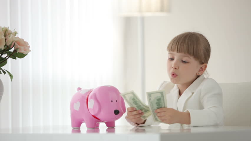 little girl piggy bank