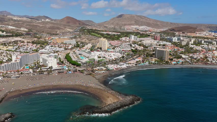 Aerial view of the landscape of the coastal town, Atlantic ocean, sandy beach, mountains