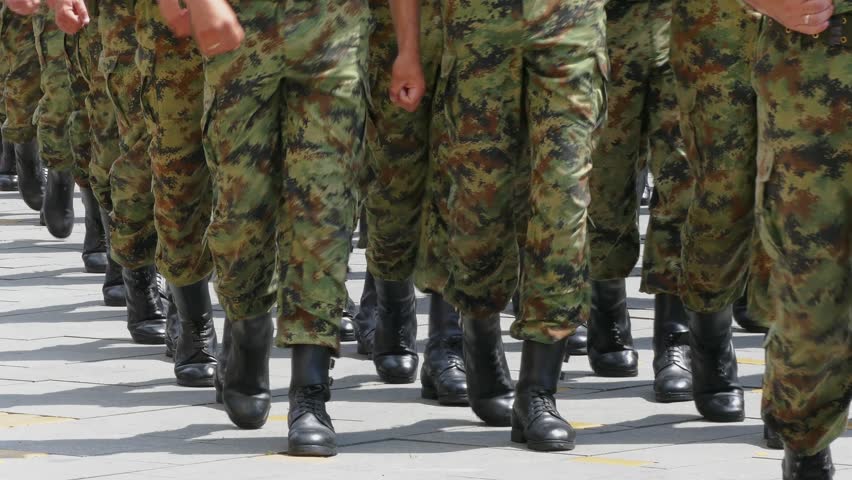 During the parade, the military troops marched in perfect order, demonstrating discipline, pride, and the power of the armed forces.