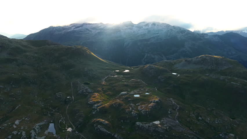 Stunning Swiss Alps view, majestic, serene, mountainous landscape at dawn