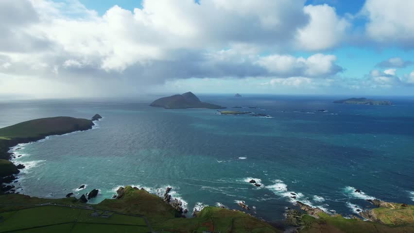 epic Irish seascapes drone defending blanket islands from Douncoin Slea Head Dingle on a showery autumn day