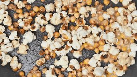 Video of popcorn being fried in a frying pan - Powered by Shutterstock - Get 15% off with code: PIKWIZARD15