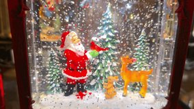 Christmas-Themed Snow Globe Lantern with Falling Snow Effect – 4K High Quality Footage - Powered by Shutterstock - Get 15% off with code: PIKWIZARD15