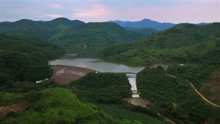 Wide aerial view of El Carrizo Dam and mountains in Jalisco, Mexico