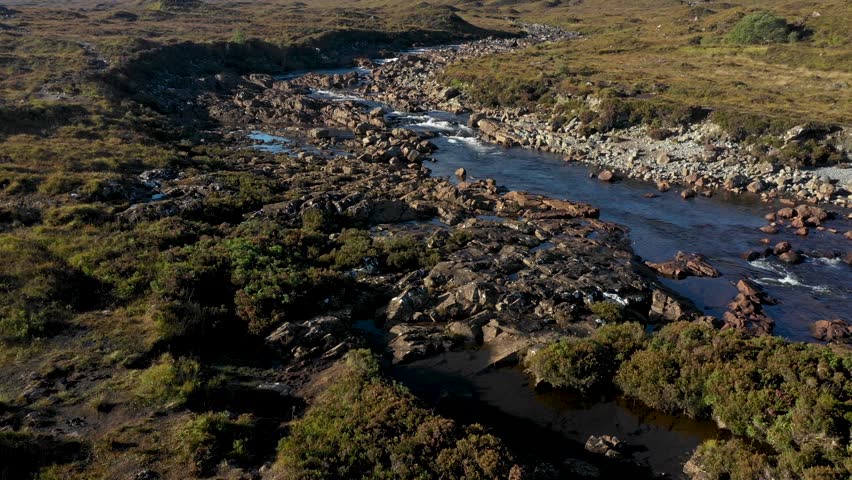 Drone view of Sgrr nan Gillean mountain and Sligachan Waterfalls in the Isle of Skye, Scotland