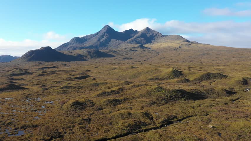 Drone view of Sgrr nan Gillean mountain and Sligachan Waterfalls in the Isle of Skye, Scotland