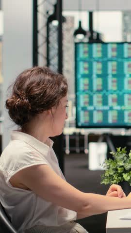 Vertical Video HR admin conducting a job interview with a black hopeful candidate with amazing experience and recommendations. Doing evaluation for alignment with corporate hiring standards. Camera B.